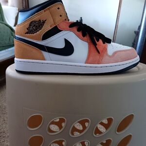 Nike air jordan mid sneakers.